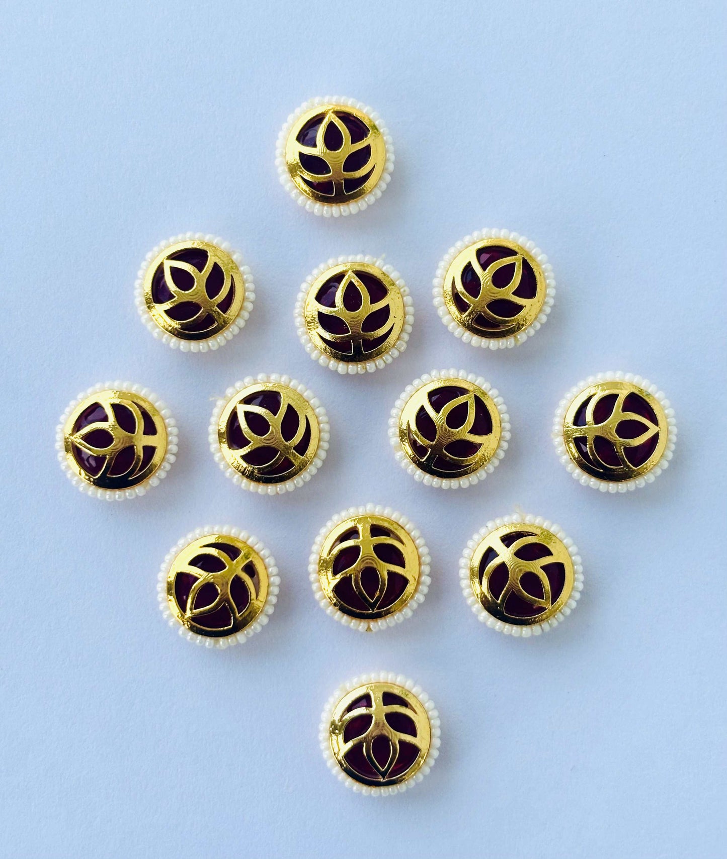Maroon Leaf Motif Pearl Border Kundans