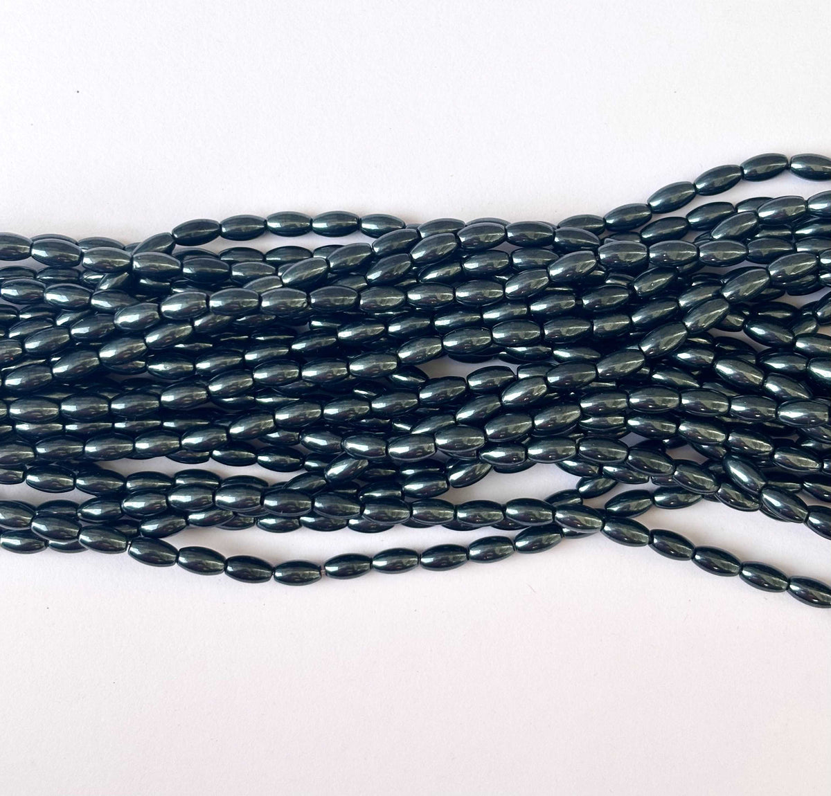 116 Pieces High Shine Monalisa Lustre Black Oval Beads