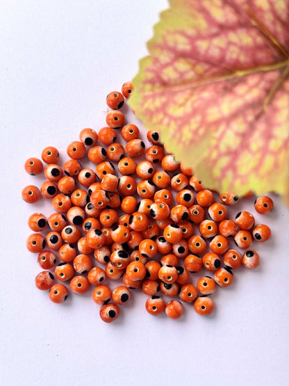 Orange Glass Evil Eye Beads