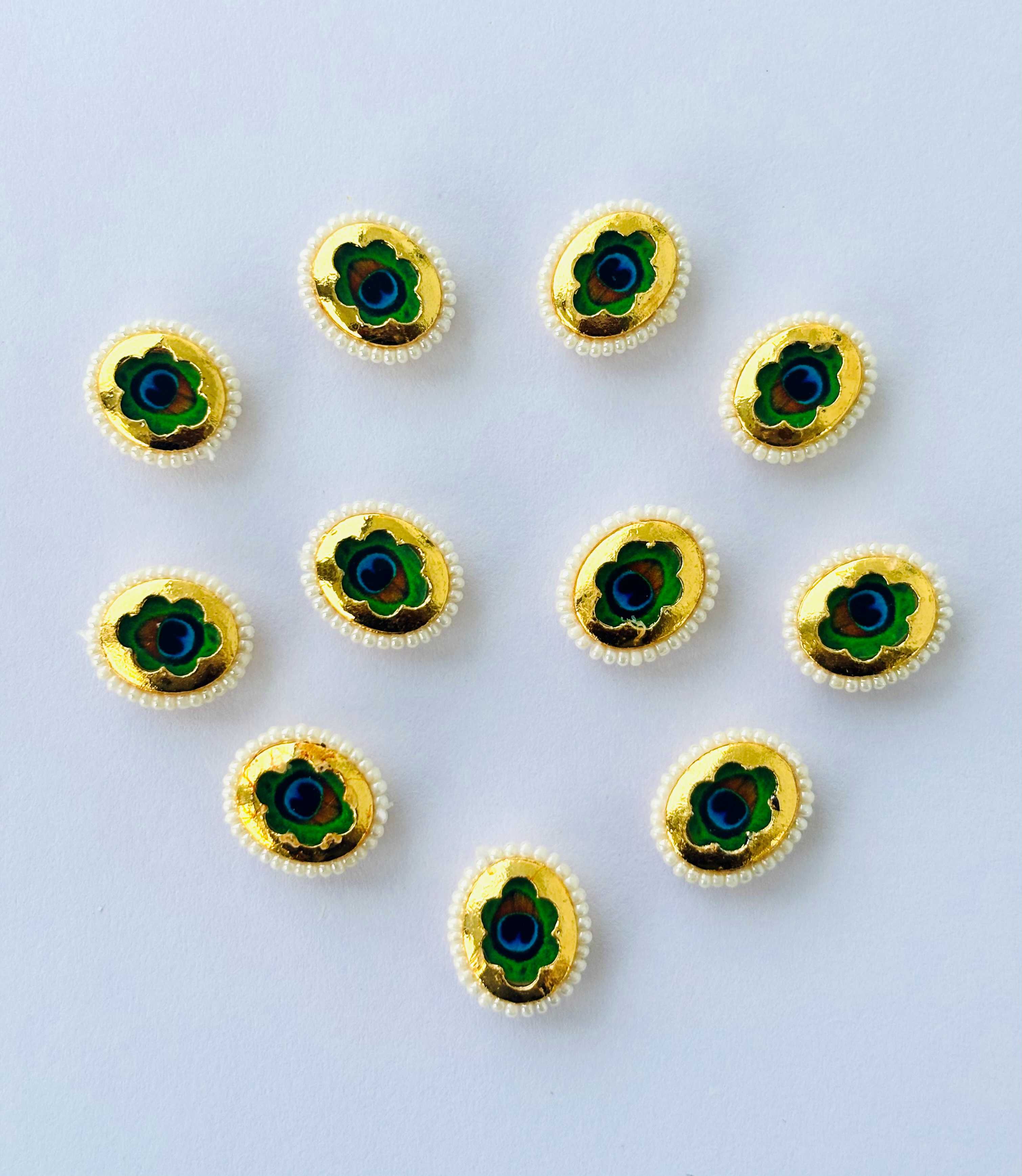 Oval Peacock Feather Pearl Border Kundans
