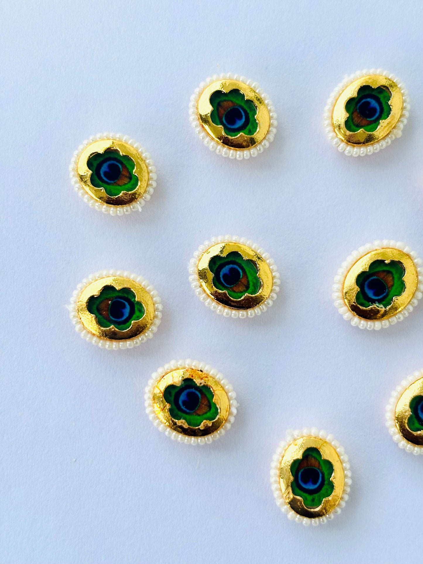 Oval Peacock Feather Pearl Border Kundans