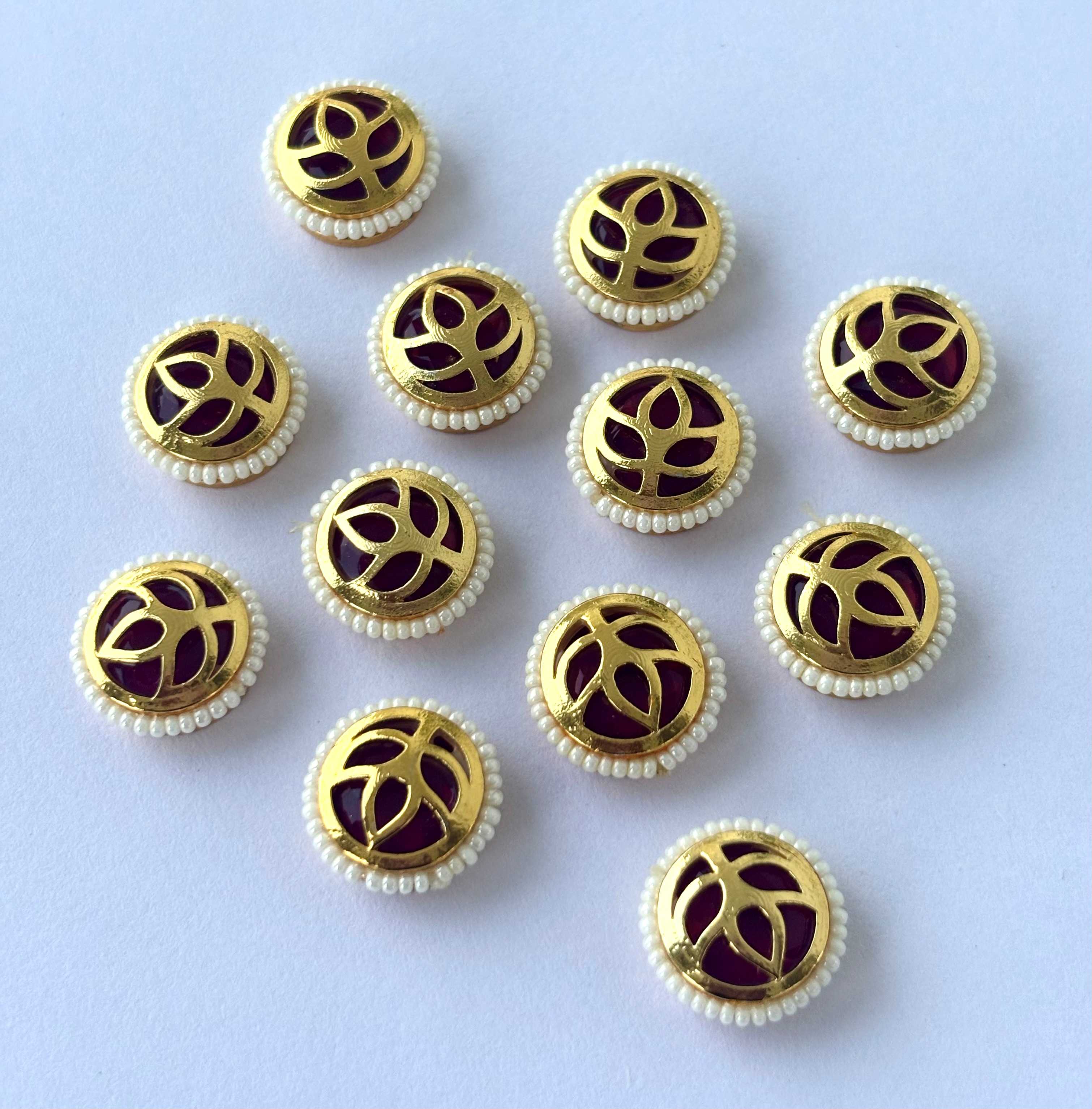 Maroon Leaf Motif Pearl Border Kundans