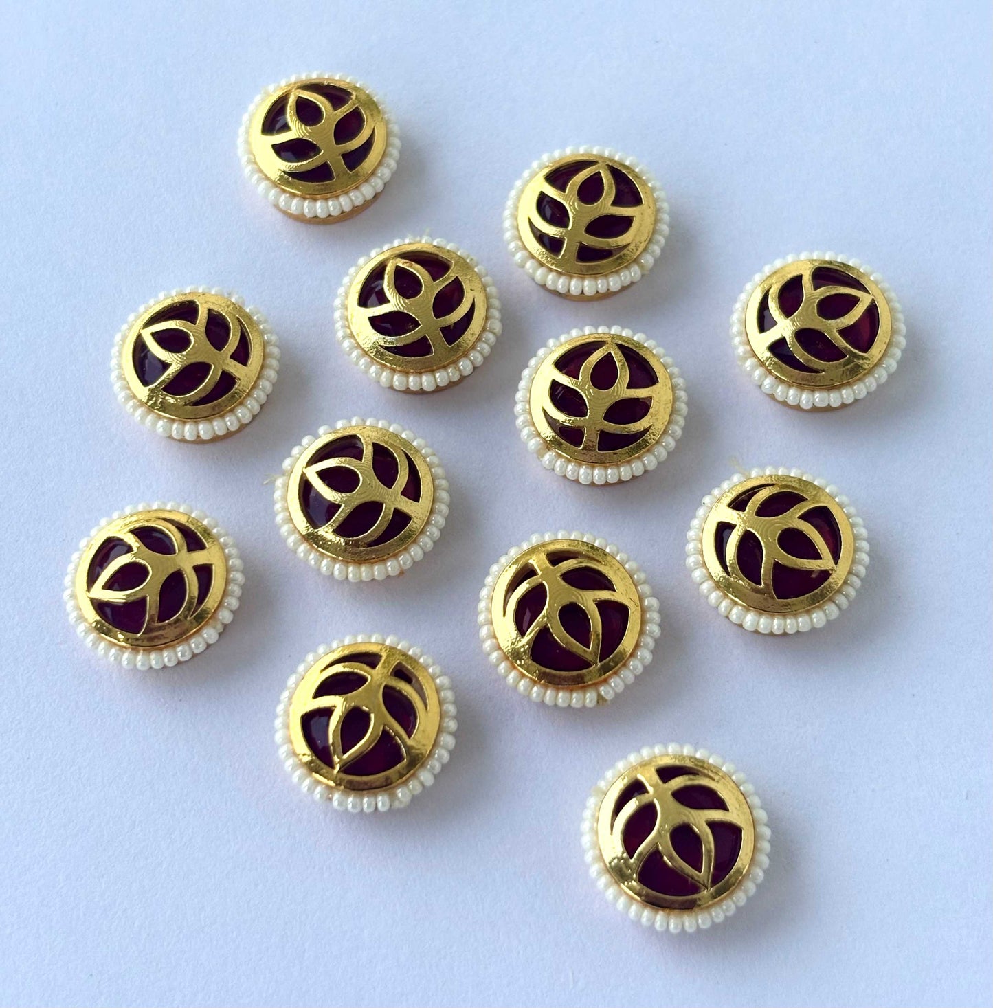 Maroon Leaf Motif Pearl Border Kundans