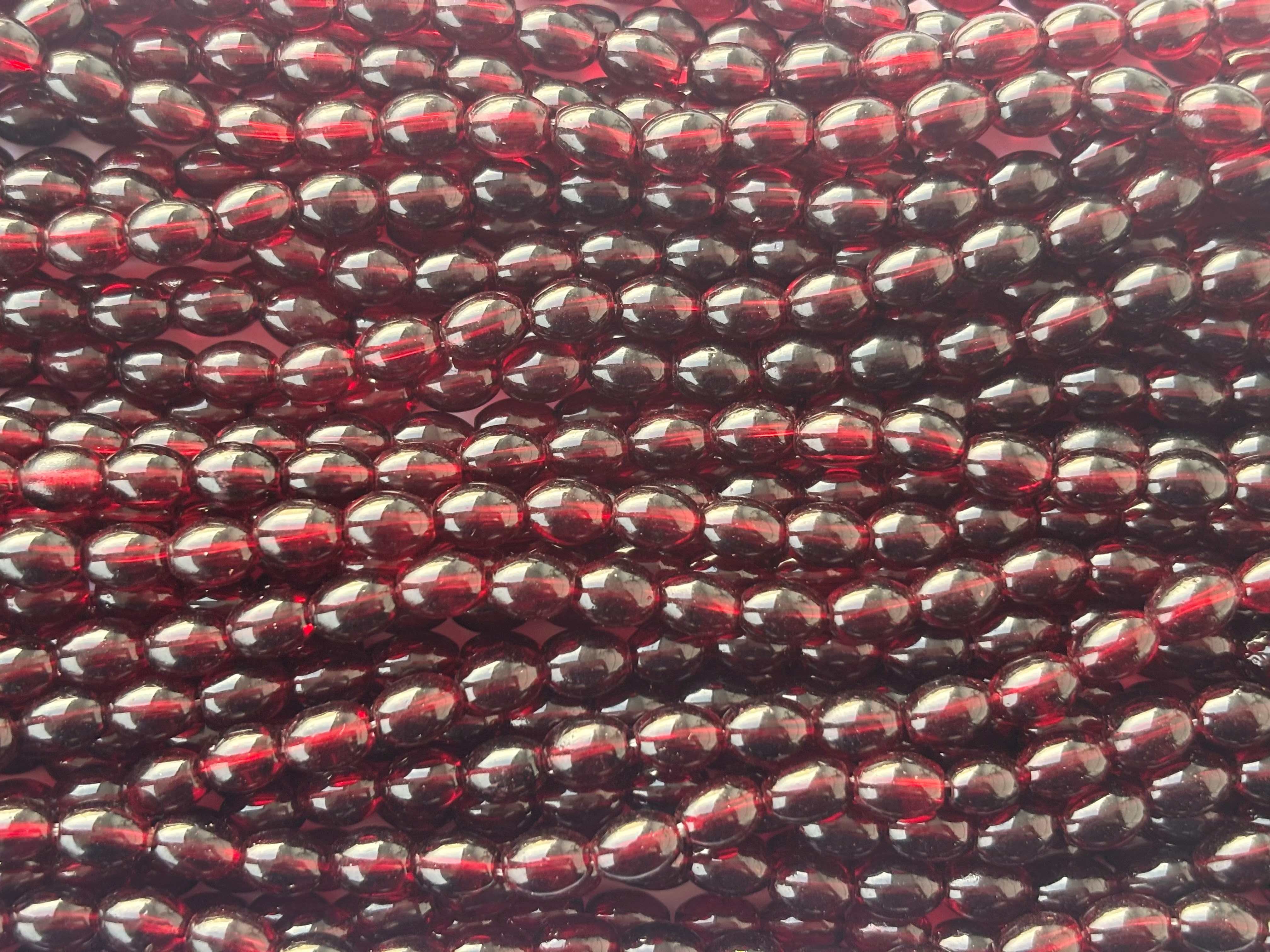Dark Garnet Jelly Oval Beads 6x8MM 26 Inches