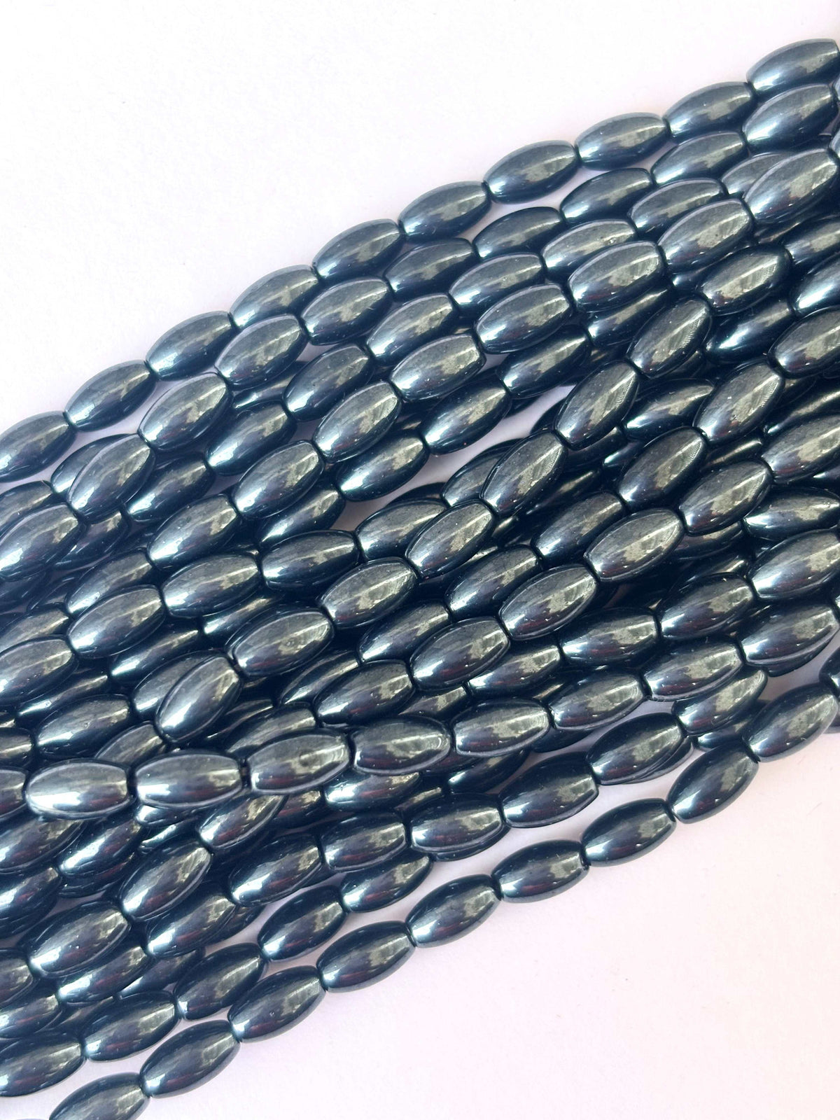 116 Pieces High Shine Monalisa Lustre Black Oval Beads