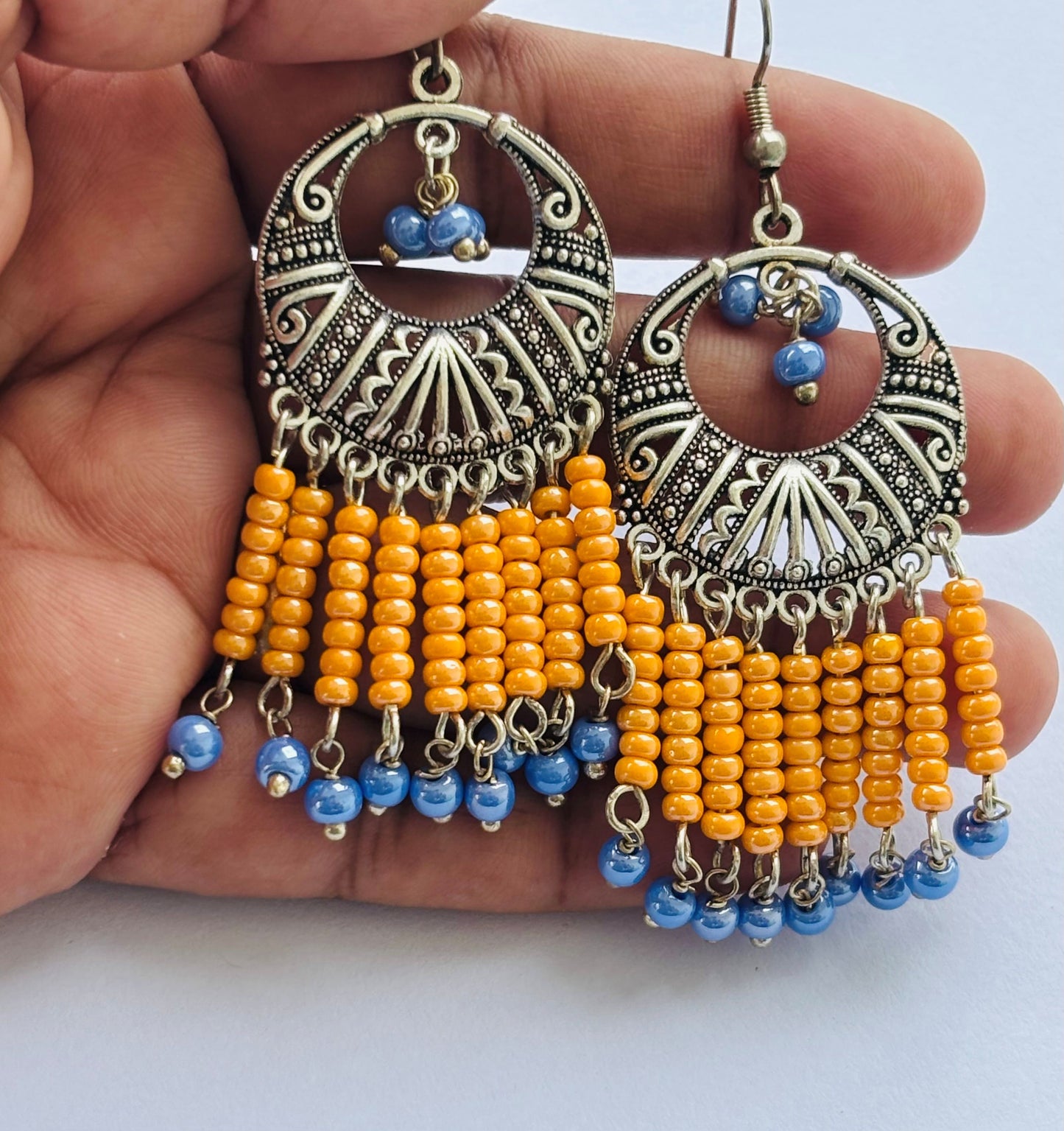 Oxidized Silver Tassel Earrings with Orange and Blue Beads