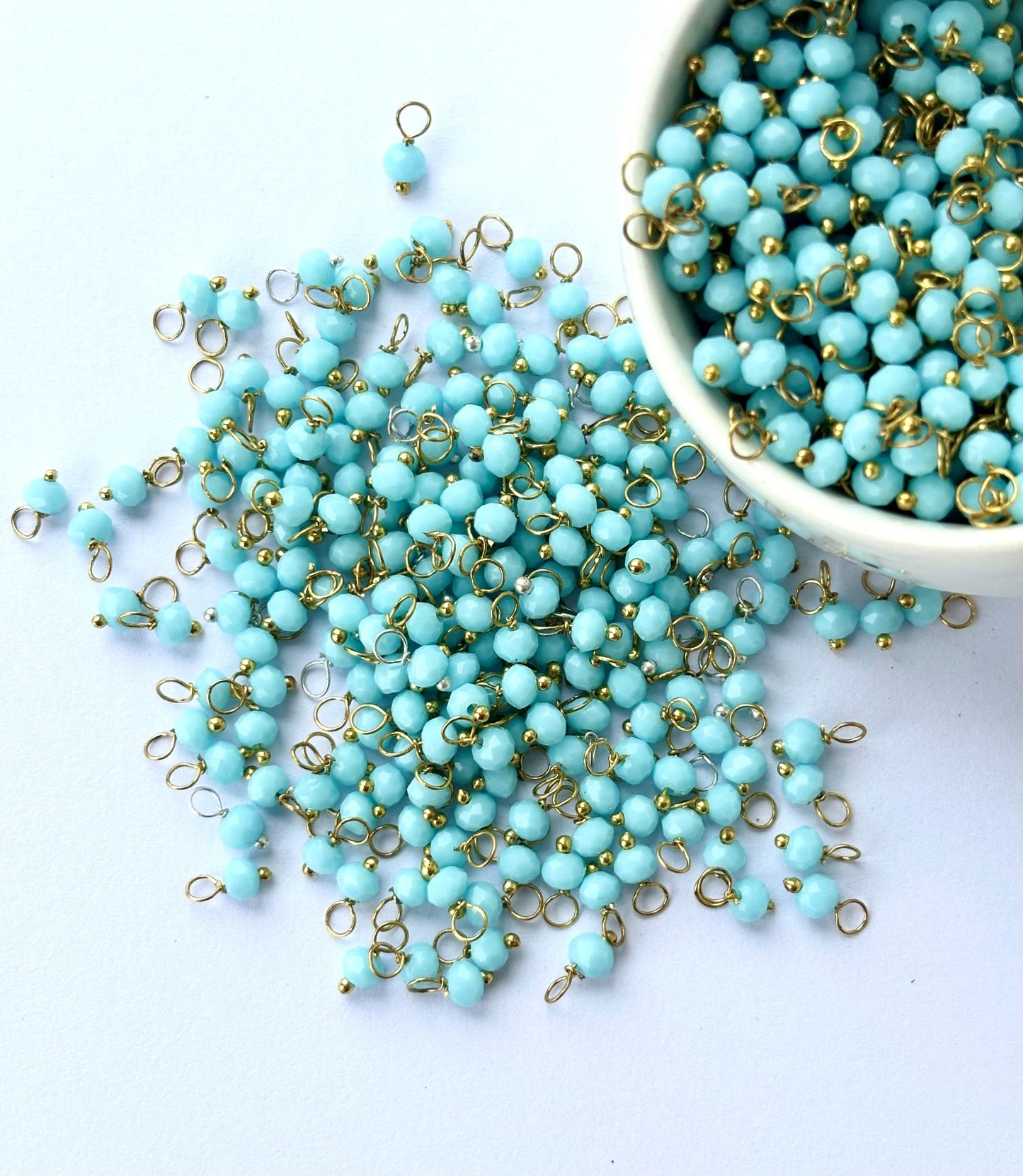 Faceted Artic Blue Charms with Golden Wire