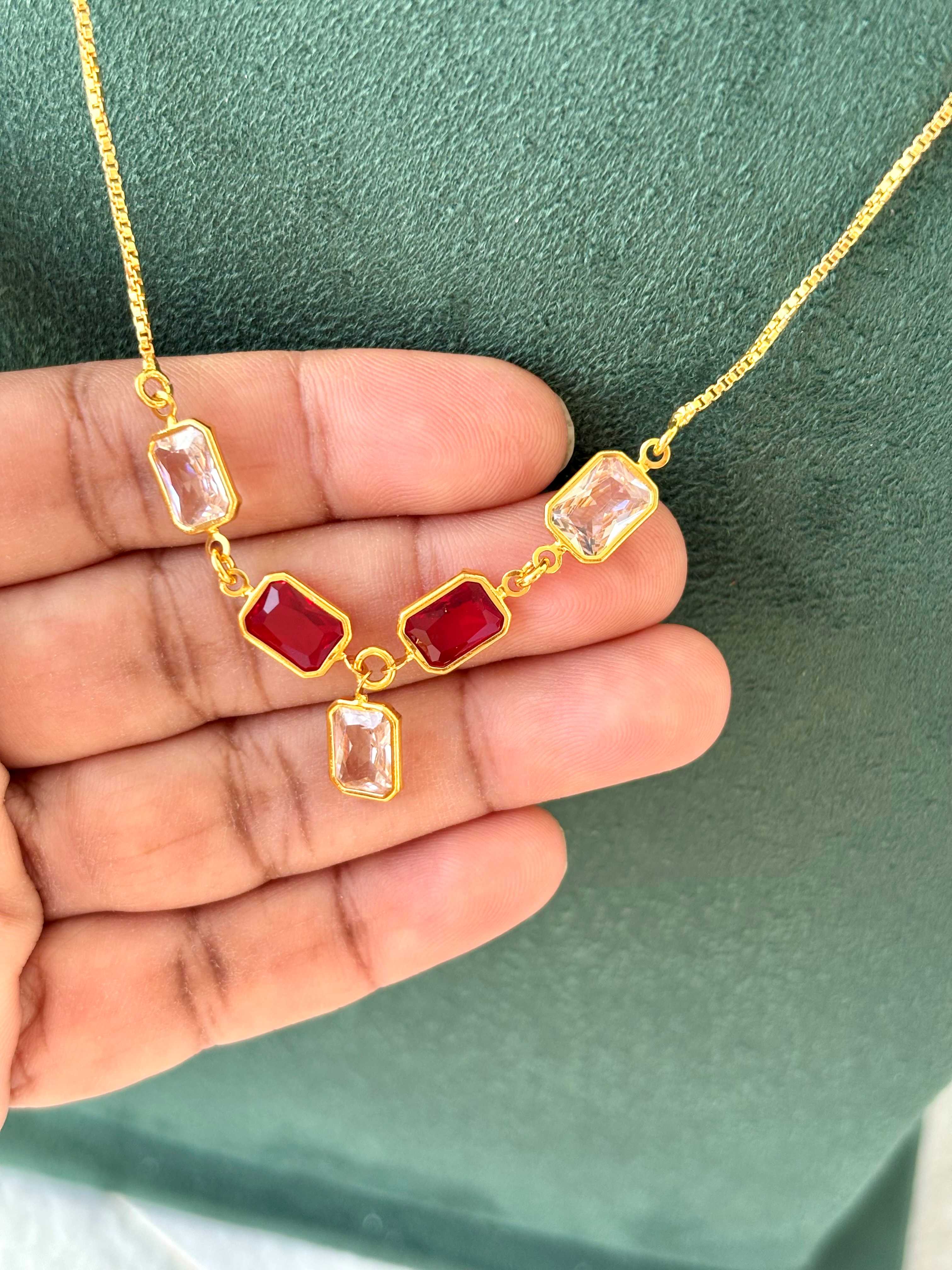 Gold Necklace with Red and Clear Crystal Stones