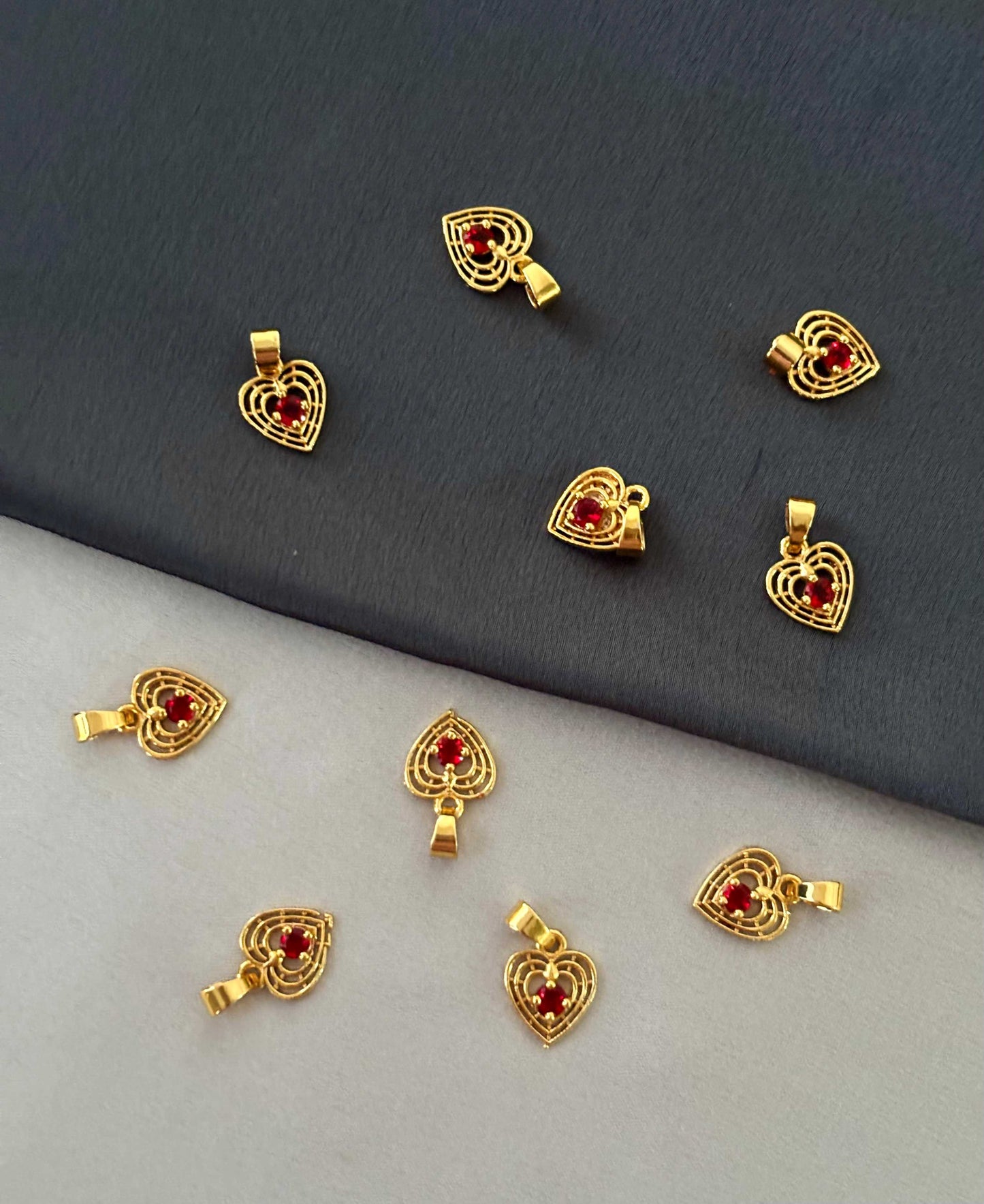 Gold-Plated Sunburst Red Stone Heart Pendant