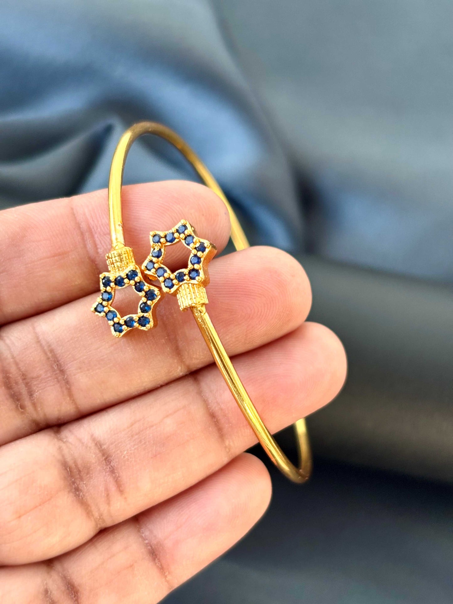 Gold-Plated Cuff with Blue Star Accents