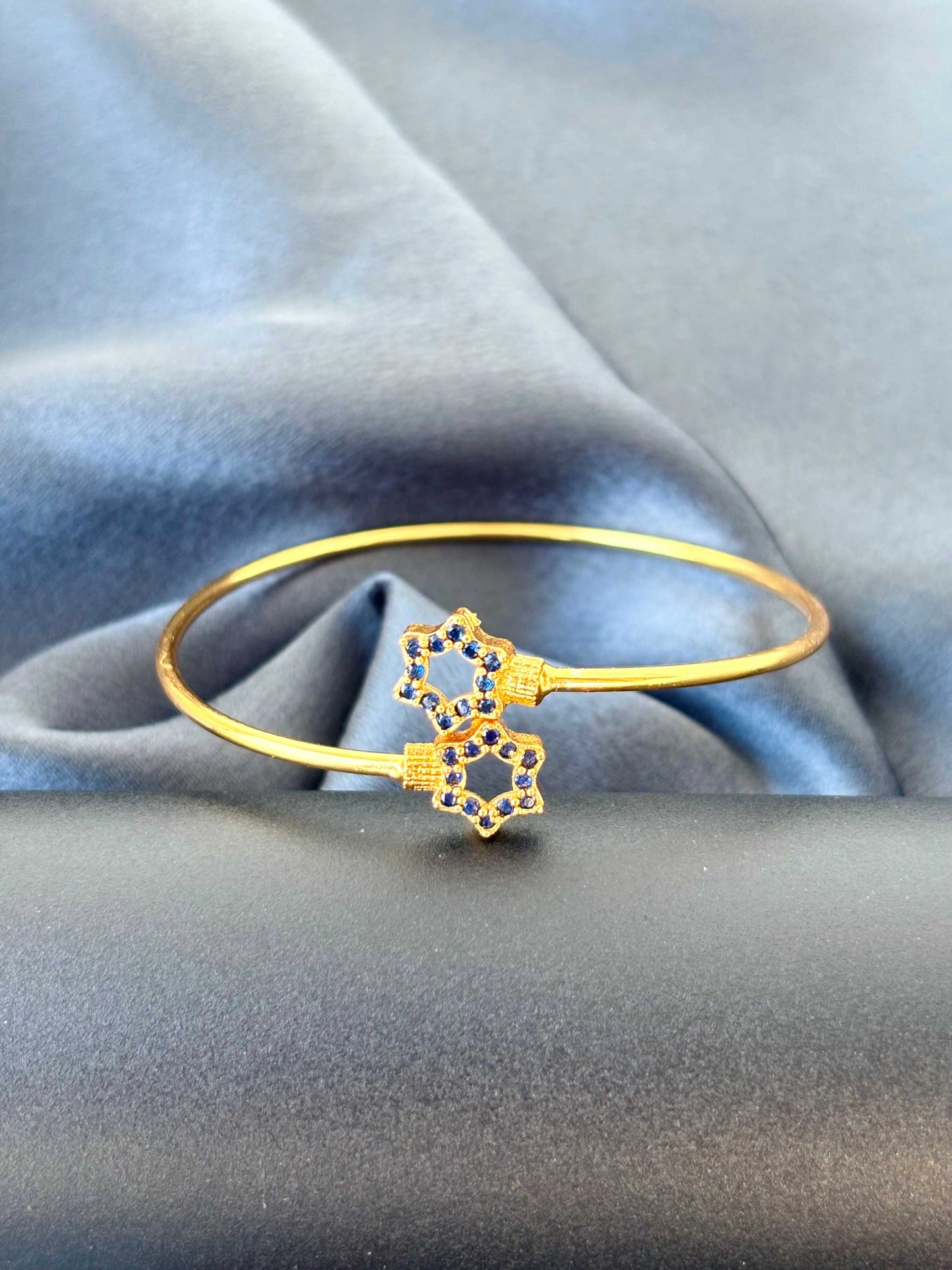 Gold-Plated Cuff with Blue Star Accents