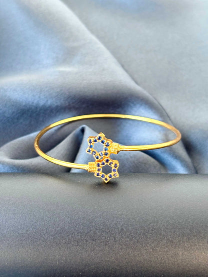 Gold-Plated Cuff with Blue Star Accents