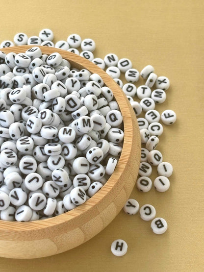 Flat Round White and Black Letter Beads
