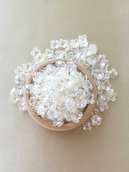 Iridescent Clear Four-Petal Flower Beads