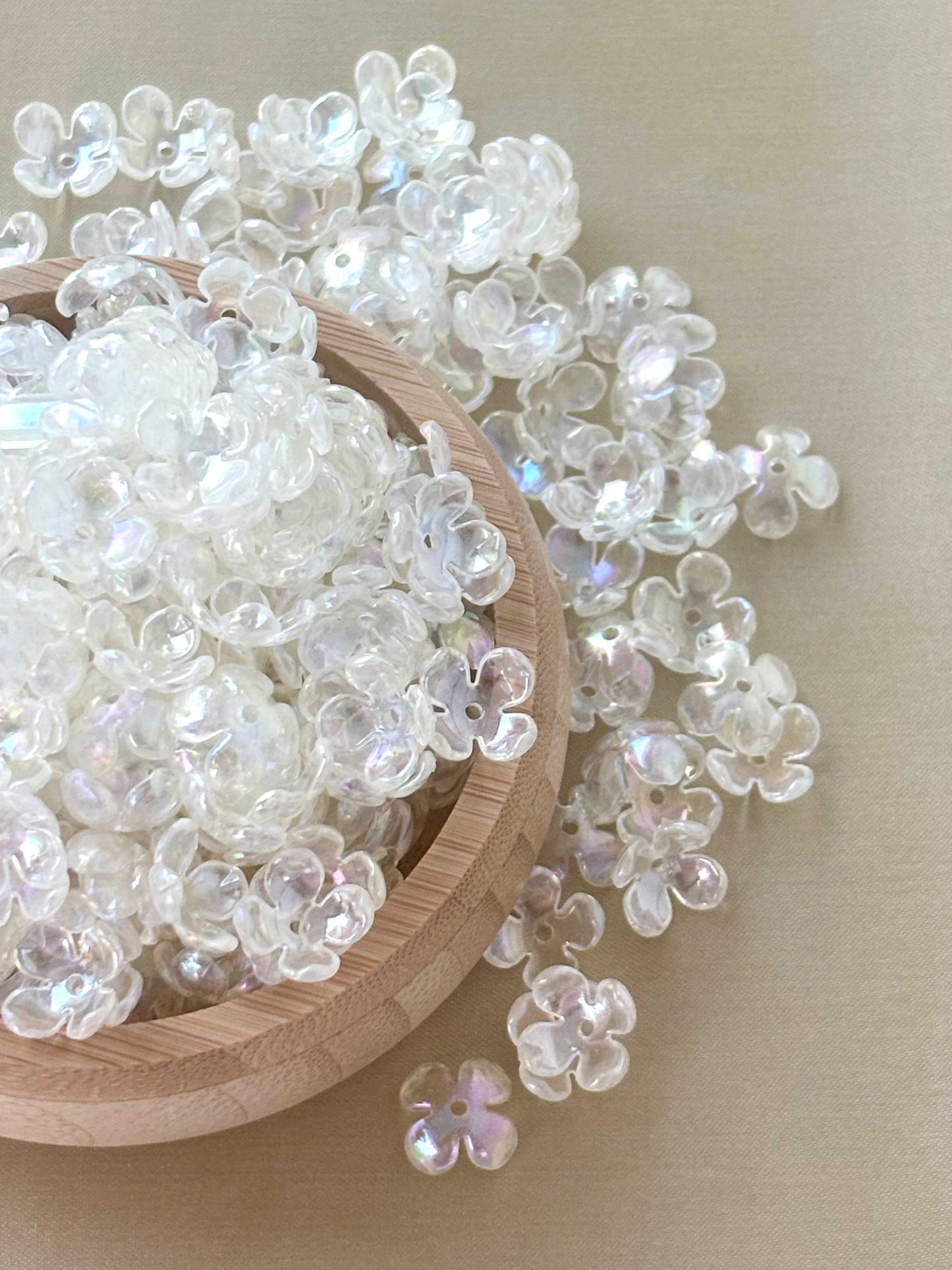 Iridescent Clear Four-Petal Flower Beads