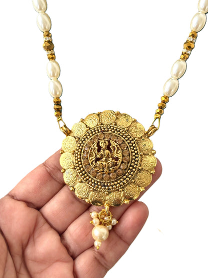 Gold Sunburst Medallion and Rice Pearl Necklace