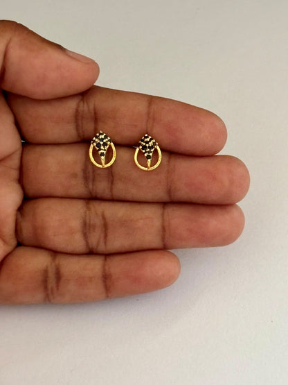 Gold-Plated Oval Stud Earrings with Black Stone Cluster