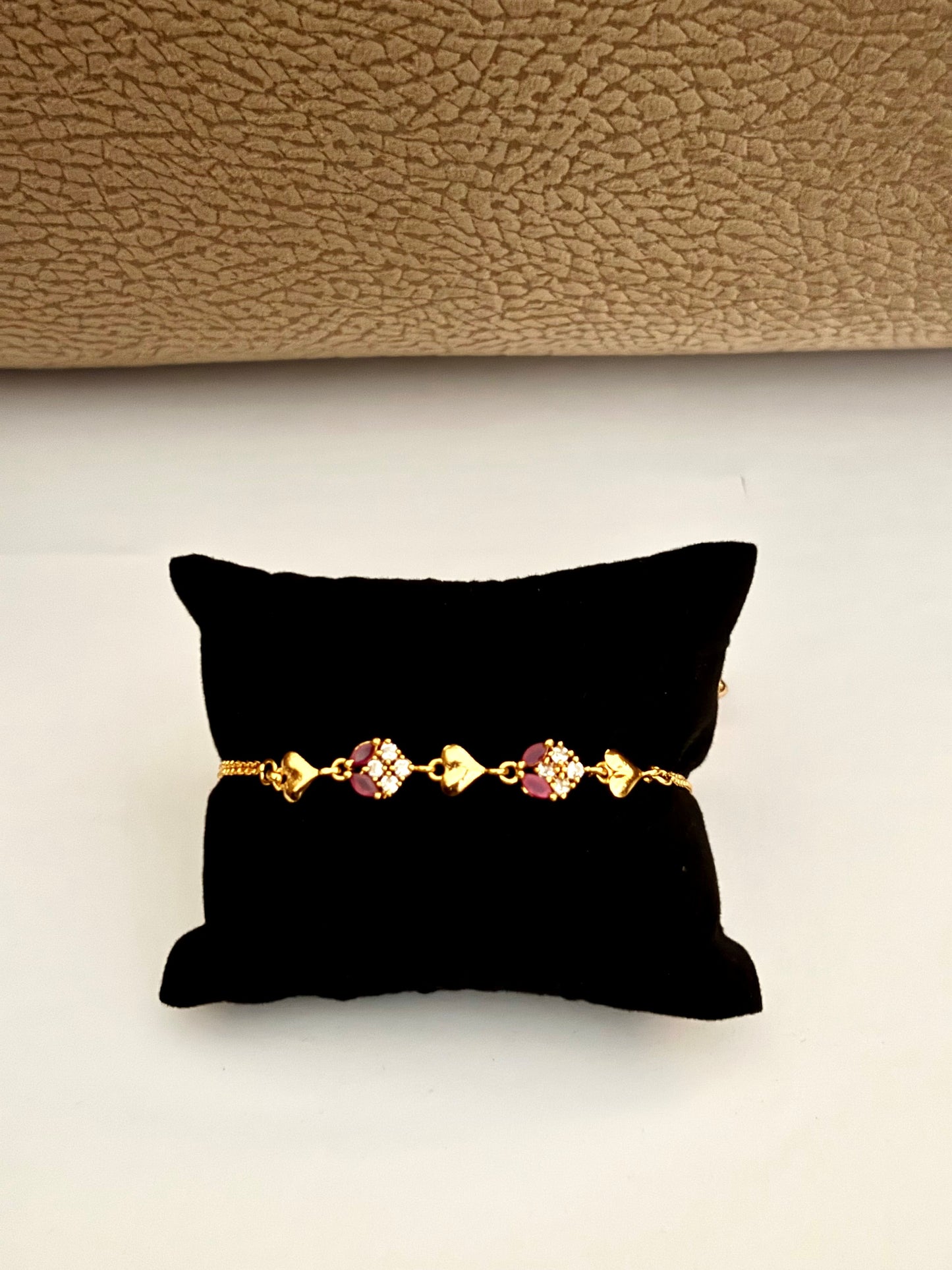 Gold-Plated Heart Bracelet with Ruby and White Stones