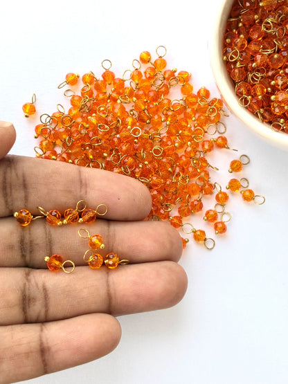 Faceted Fanta Orange Bead Charms with Gold Wire