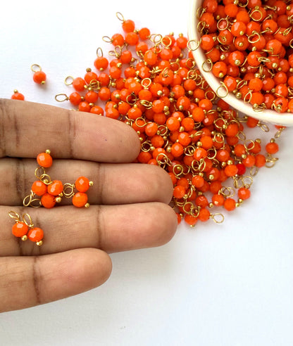 Faceted Orange Bead Charms with Gold Wire