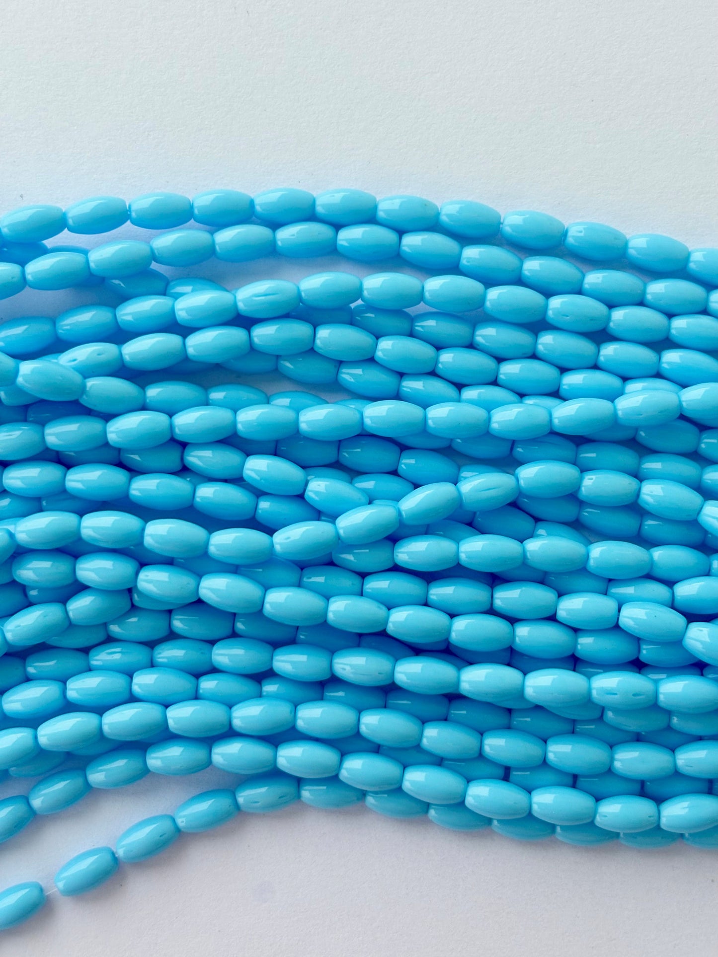 Smooth High Shine Monalisa Sky Blue Oval Beads